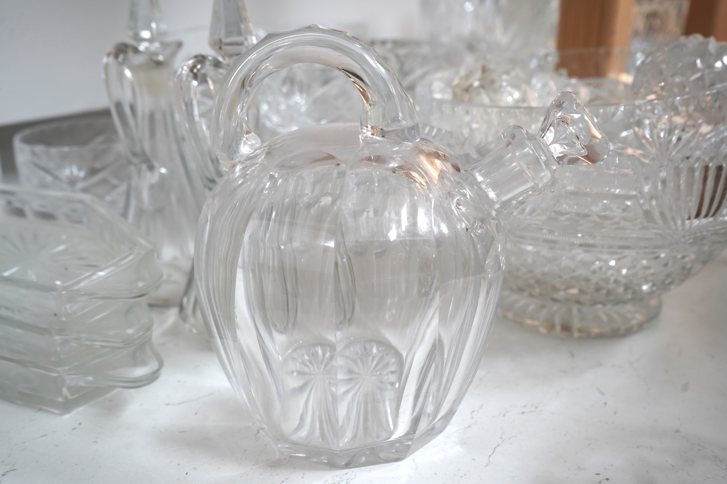 A collection of various cut glass